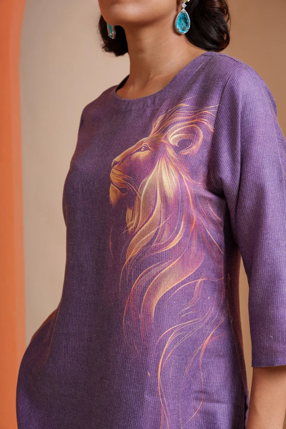 Purple viscose tunic with golden lion print, elegant designer wear for women