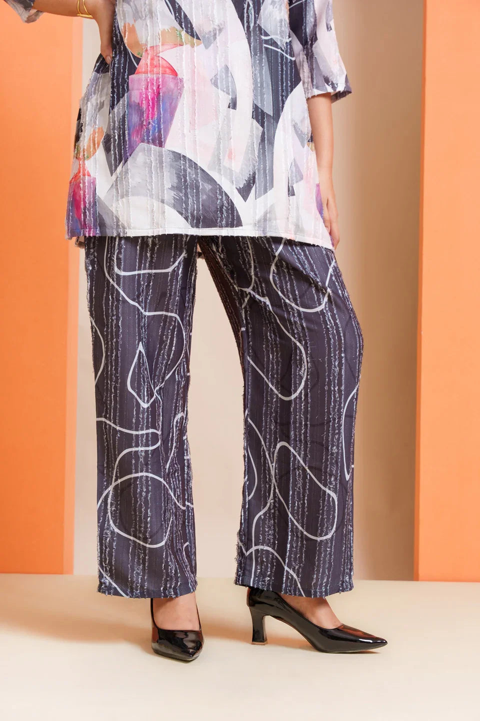 Abstract print co-ord set in viscose fabric, stylish wide-leg pants with top, perfect for parties and everyday wear