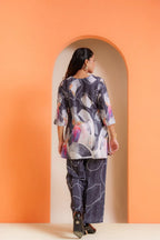 Woman in abstract print co-ord set, pure viscose fabric, stylish for parties & everyday wear